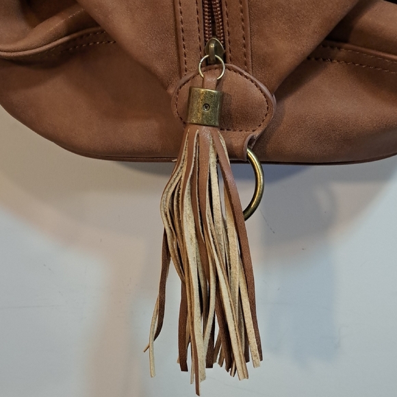 Tassel Accent Tan Leather Sling Backpack - Picture 3 of 9